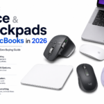 Hero image showcasing the best mice and trackpads for MacBooks in 2026, featuring a MacBook Pro, Apple Magic Trackpad, Logitech MX Master, Logitech MX Anywhere, Logitech Lift Vertical Mouse, and premium wireless pointing devices for macOS productivity.